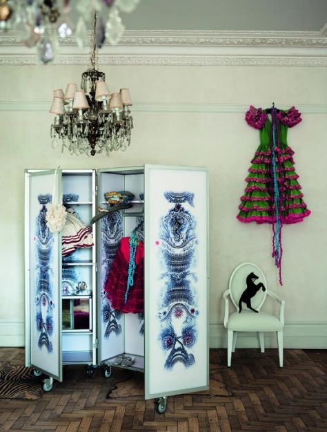 And why not hang clothes on the wall. (desiretoinspire.net)