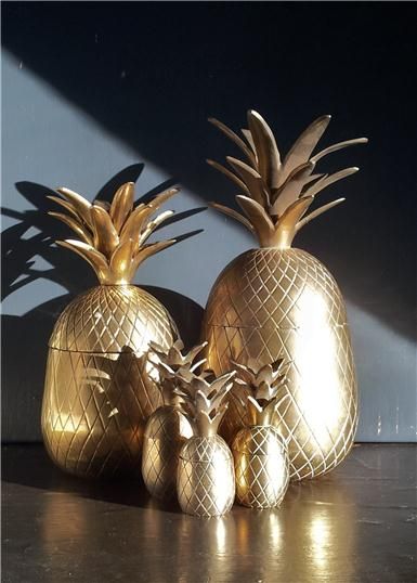 Vintage mid century brass pineapples. (tumblr.com)