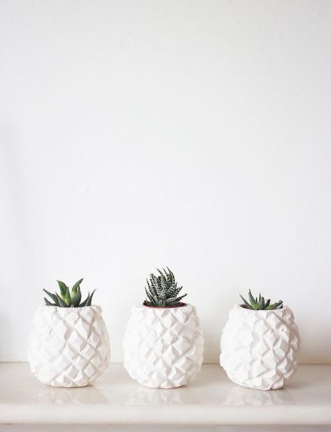 Pineapple vases. (bloglovin.com)